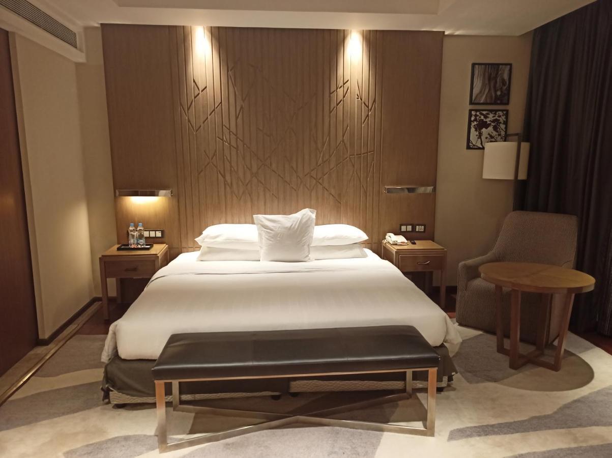 웰컴호텔 벵갈루루 외부 사진 A bedroom at the hotel